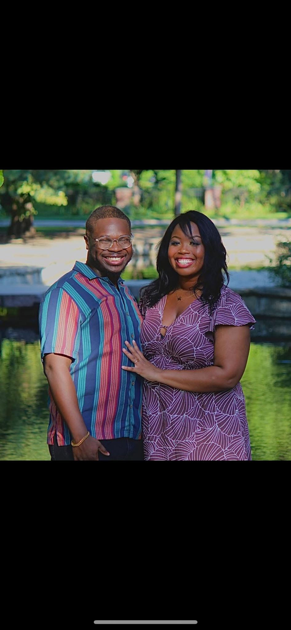 Charlotte and Dami by the pond